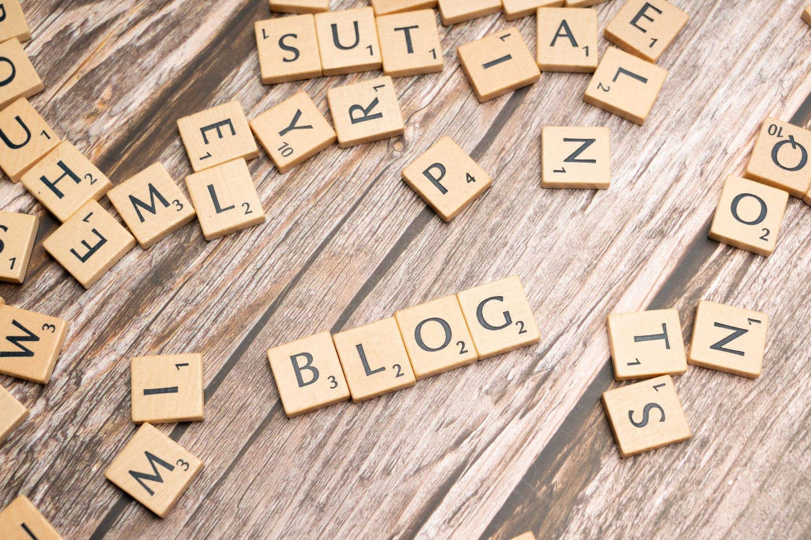 Blog spelled with letter tiles on a wooden desk