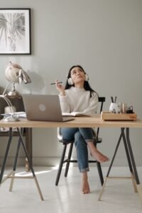 Blogger planning content strategy for a new blog at her desk