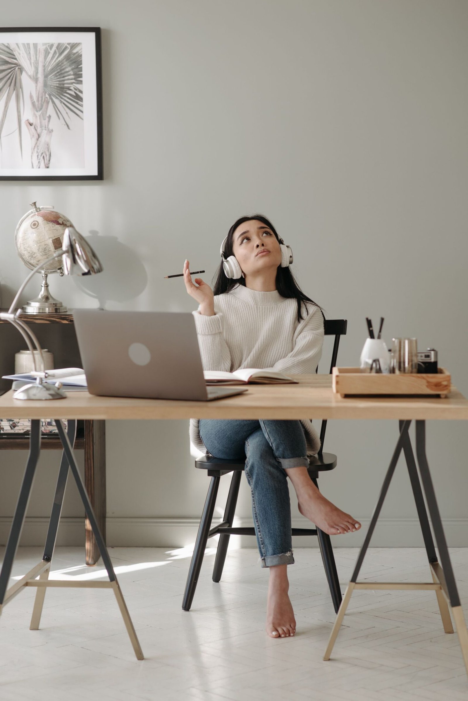 Blogger planning content strategy for a new blog at her desk